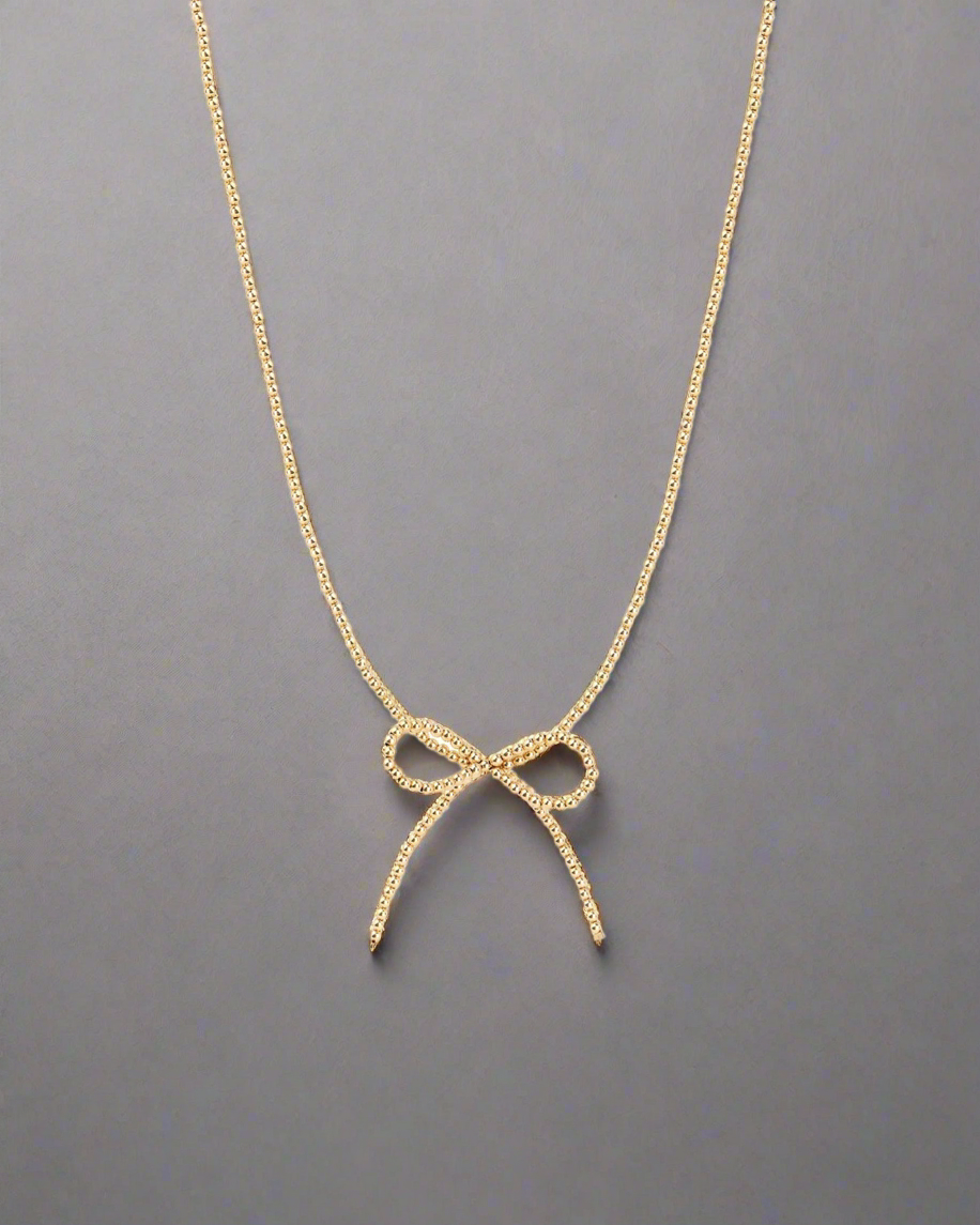 Beaded bow necklace